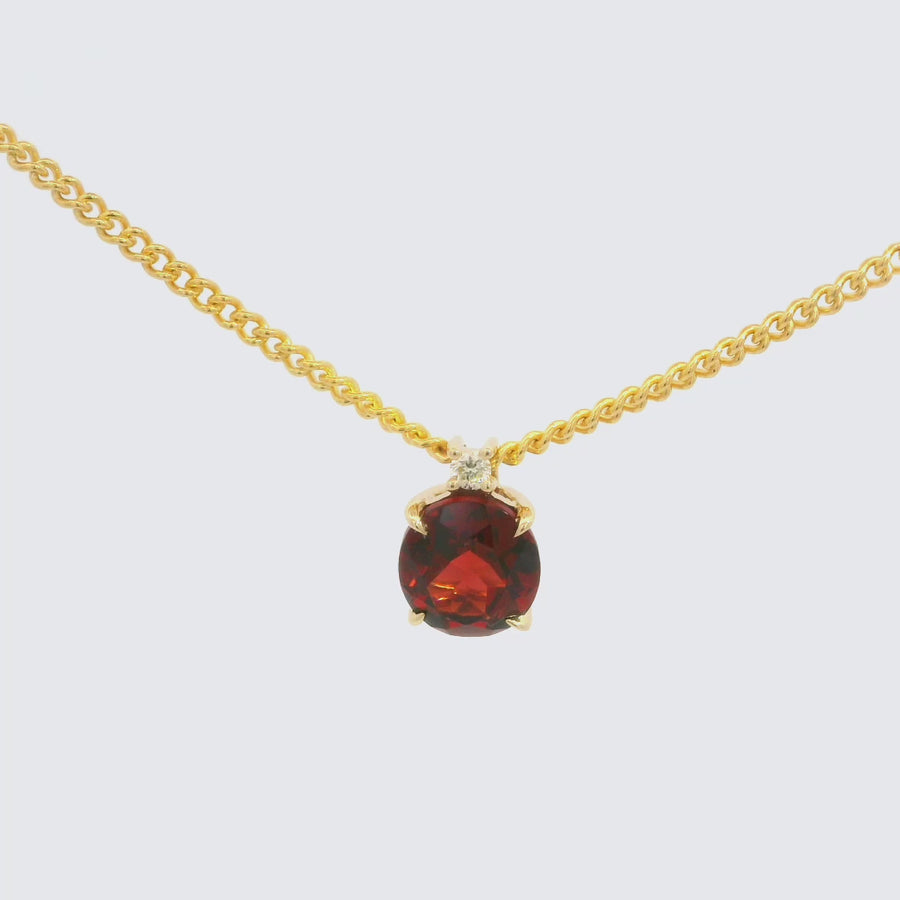 Oval Cut Garnet, Diamond & Yellow Gold Pendant