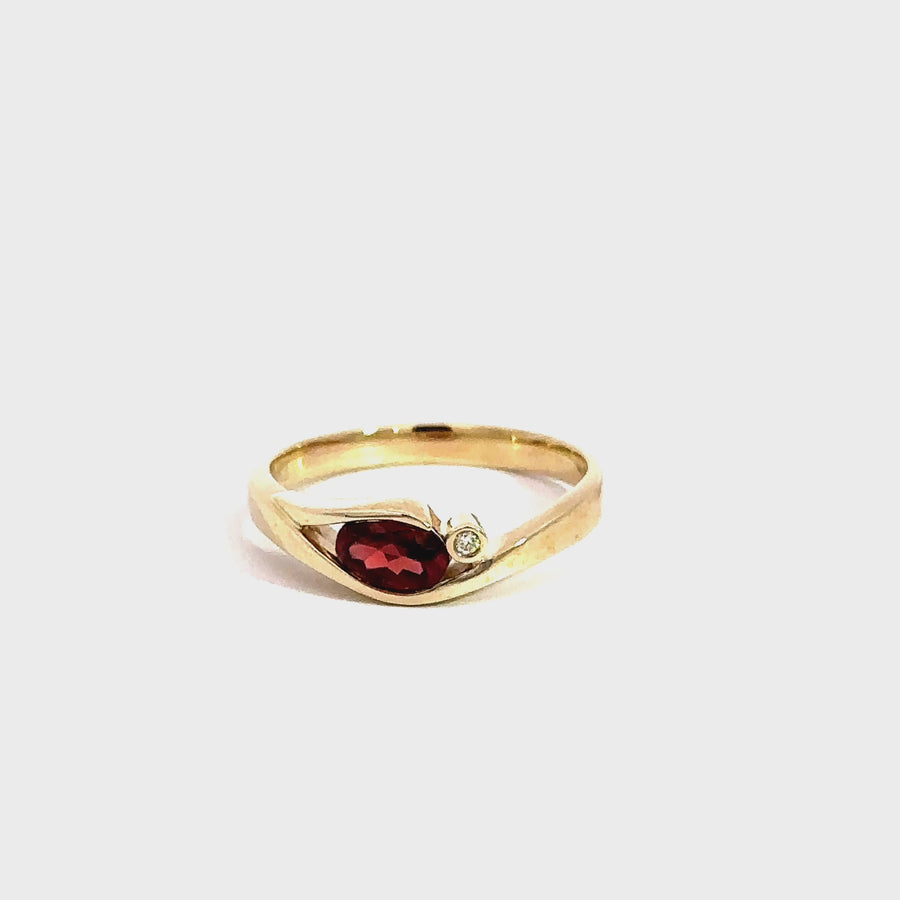 Oval Cut Garnet, Diamond & Yellow Gold Ring