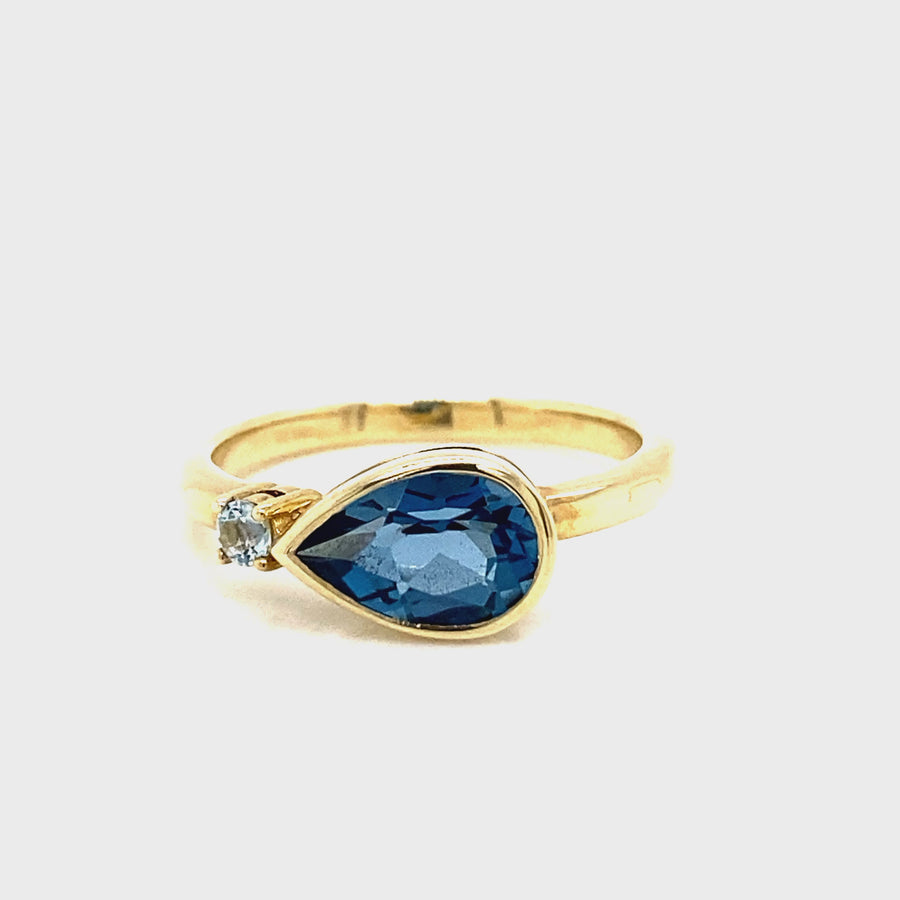 Topaz & Yellow Gold Bezel Set Dress Ring